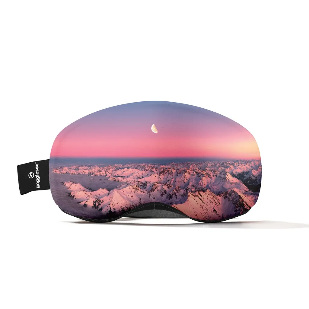 Protective ski goggle cover with mountain motif at sunrise and half moon.