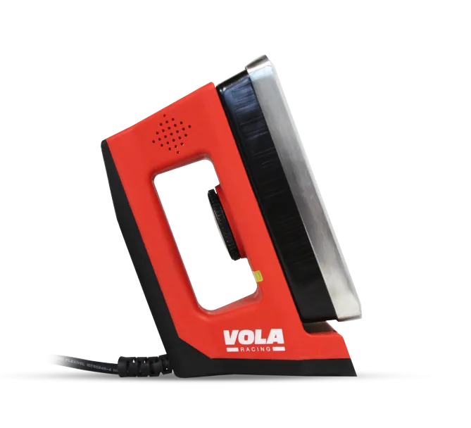 Red, digital waxing iron with handle and temperature control, side view.
