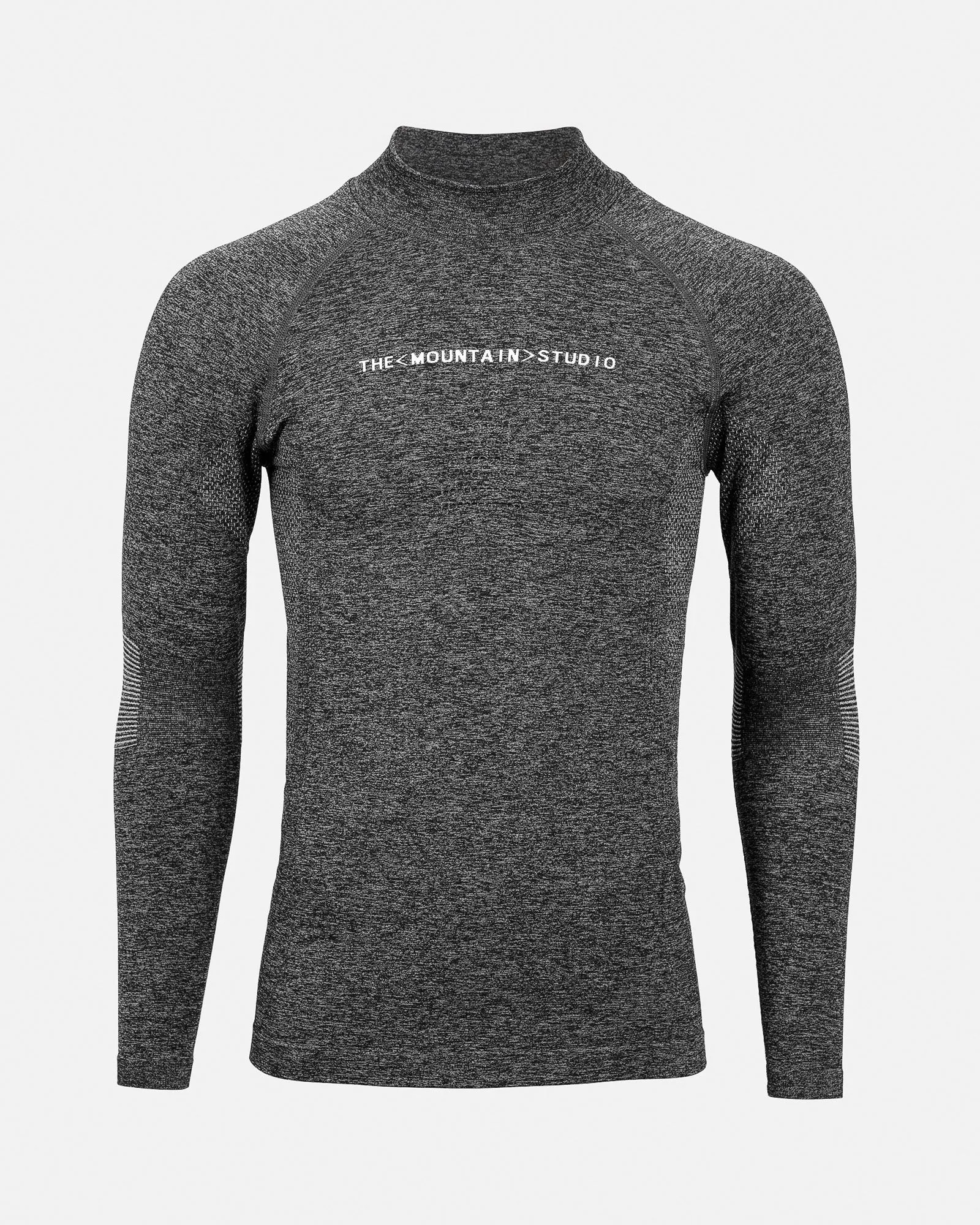 A gray, long-sleeved sports top with a stand-up collar and "THE MOUNTAIN STUDIO" lettering on the chest.
