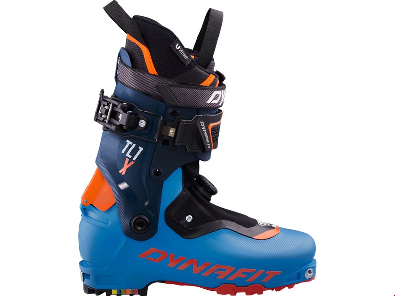 Seitliche Ansicht des Dynafit TLT X Boot Unisex Skitourenschuhs in blau, orange und schwarz.