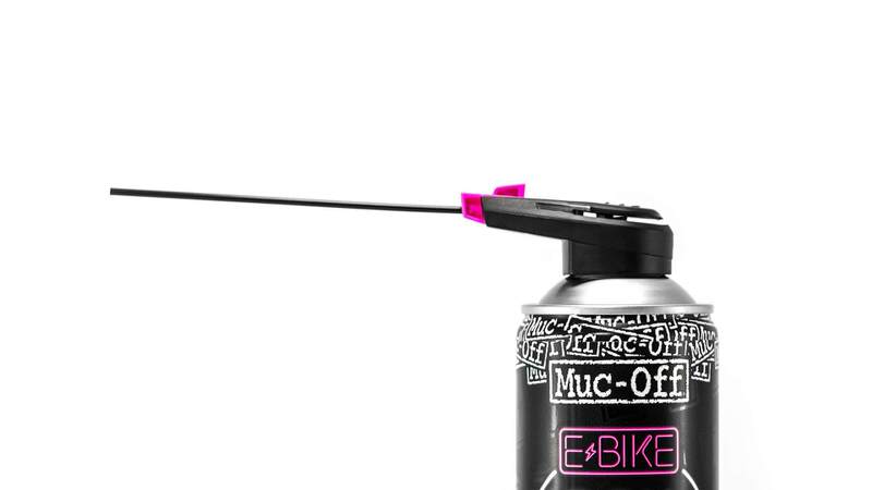 Muc-Off E-Bike Kettenöl Sprühdose Muc-Off E-Bike Kettenöl mit Sprühaufsatz und dünnem Röhrchen vor weißem Hintergrund.