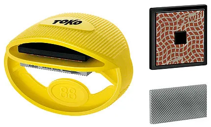 Gelbes Toko Express Tuner Kit mit Feile und Schleifdiamant zur Ski- und Snowboardkantenbearbeitung.