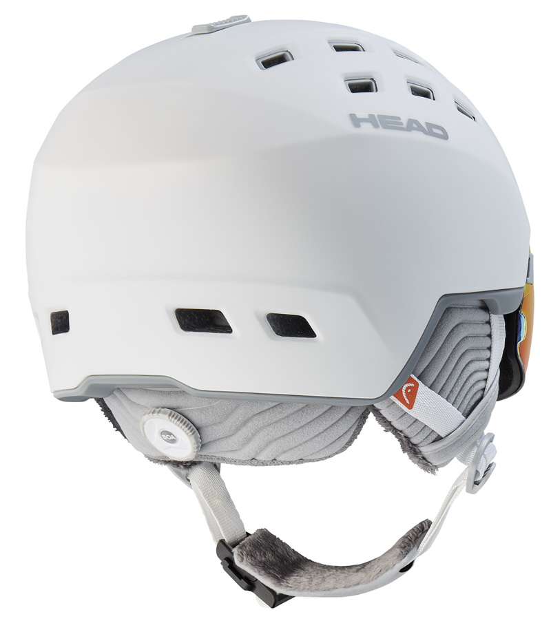 Weißer Skihelm "Head Rachel 5K Pola" mit integriertem Visier und Belüftungslöchern, seitliche Ohrenschützer und Kinnriemen.