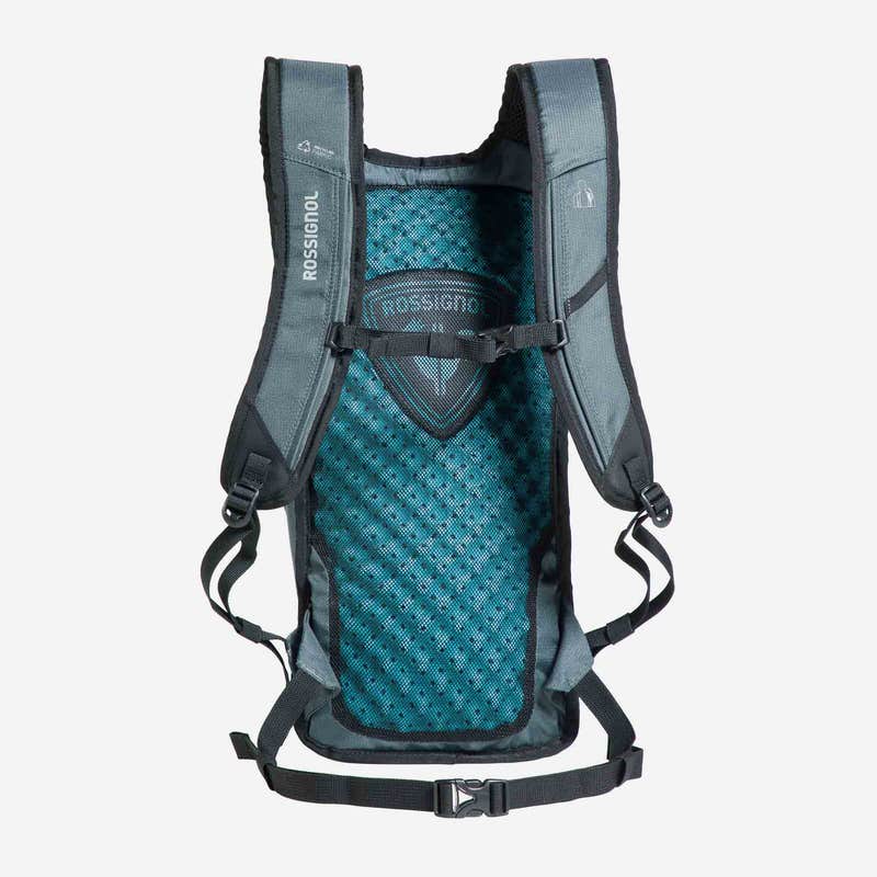 Gray Rossignol backpack Gray Rossignol Escaper Active 8L backpack with blue mesh back and black straps.