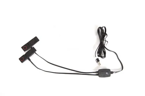 Black USB charger with two connections for Lenz heating sock batteries.