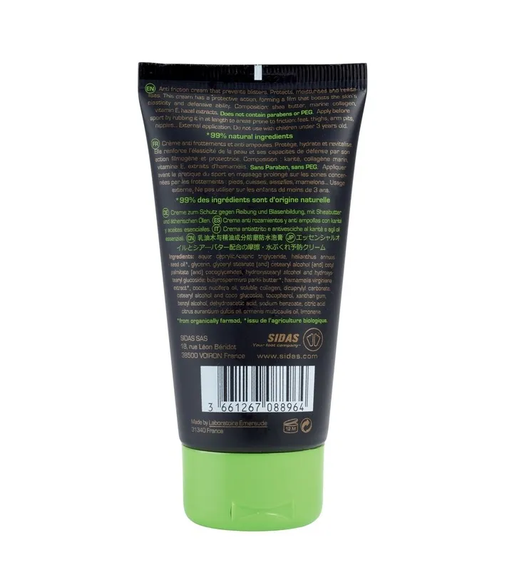 Black tube with green cap, labeled with text in several languages, including ingredients and manufacturer information.