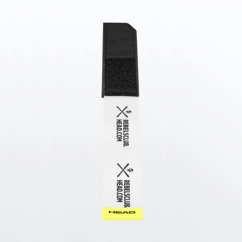Weißer Skifix mit Logo Weißer Skifix mit schwarzem Klettband und gelbem Head-Logo am unteren Ende. Darauf steht "REBELSCLUB.HEAD.COM".