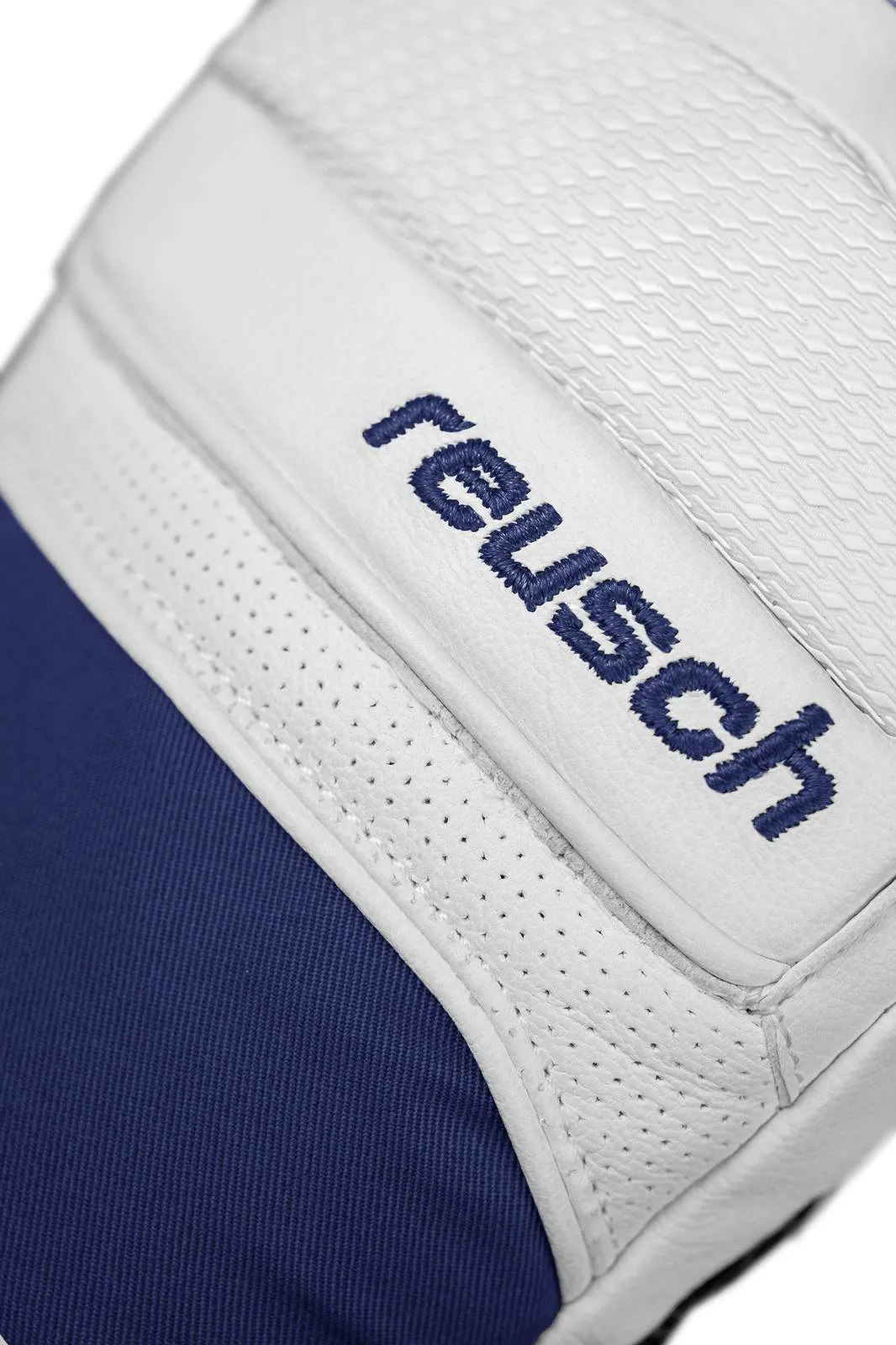 Detail of a white goalkeeper glove with blue text "reusch" and blue fabric part.