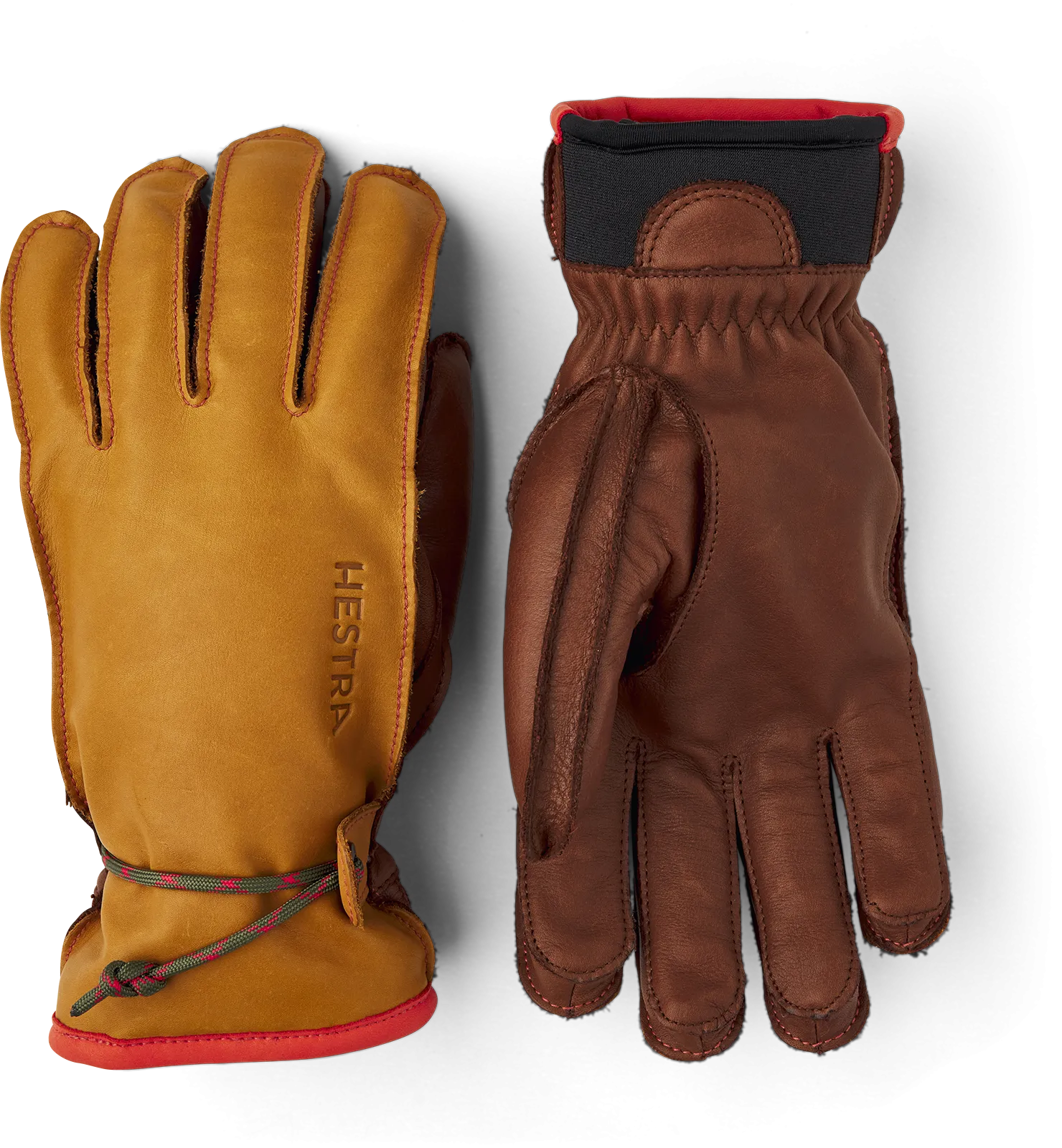 Zwei Hestra Wakayama Handschuhe, braunes und gelbes Leder mit roter Akzentuierung, liegen auf einem weißen Hintergrund.