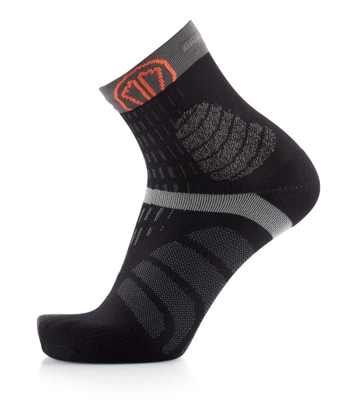 Black sock with gray edge and pattern, orange logo at the top of the shaft.