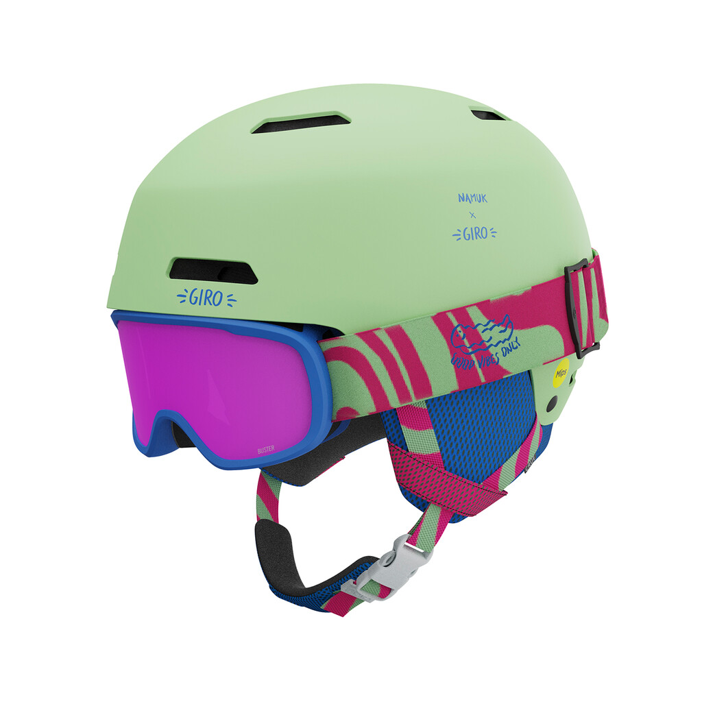 Giro Crüe Mips Helm Heller, mintgrüner Giro Crüe Mips FS Helm mit pinkfarbener Brille und gemustertem Brillenband.