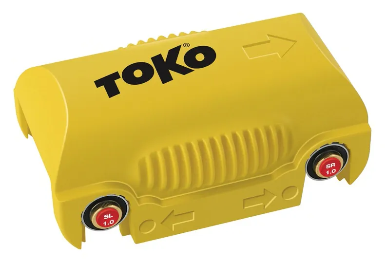 Gelbes Toko Structurite Nordic Pro Strukturiergerät mit roten Rollen und Richtungspfeilen.