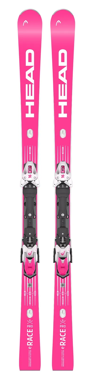 Deux skis rose vif avec des fixations blanches sont côte à côte, "HEAD" est imprimé verticalement en blanc.
