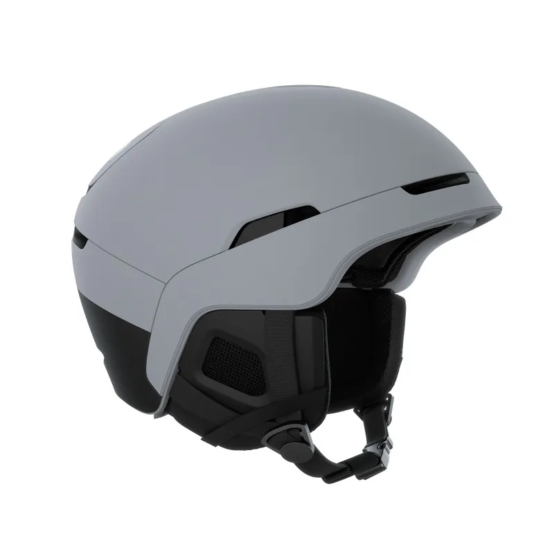 A gray ski helmet with black accents, side padding and chin strap on a white background.