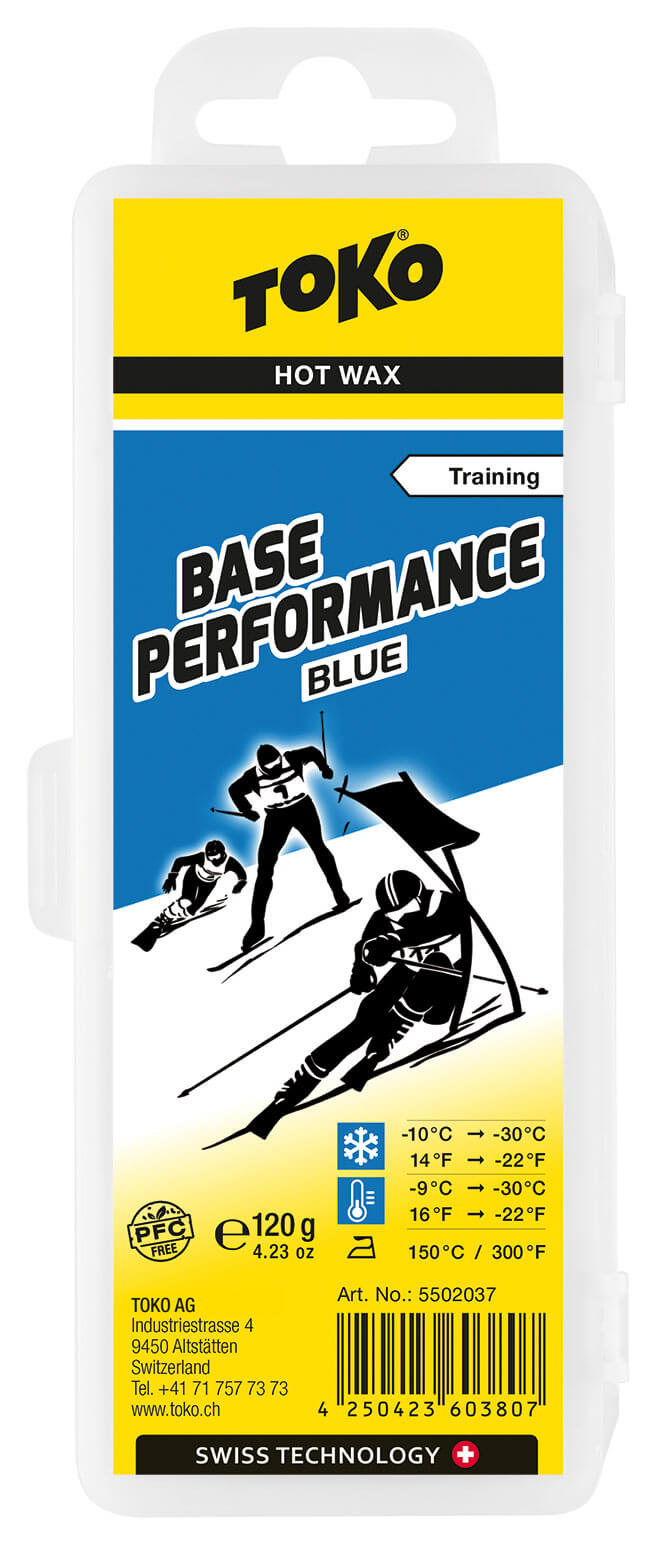Sciolina da sci Toko Base Performance Confezione della sciolina Toko Base Performance Blue con motivi di sport sulla neve e informazioni sulla temperatura.