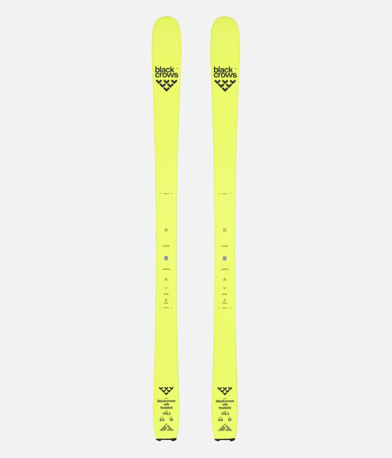 Gelbe Black Crows Orb Freebird Ski, von oben fotografiert, mit Logo und technischen Daten.