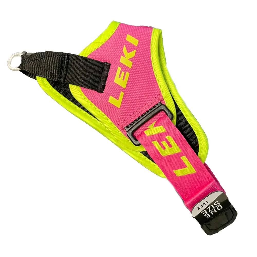 Gros plan sur une dragonne rose Leki Trigger 3D pour bâtons de ski avec des accents jaunes et une sangle noire.