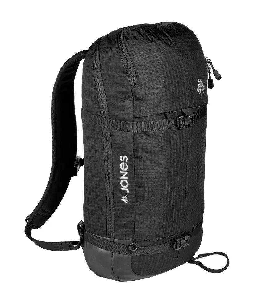 Black Jones DSCNT 19L backpack from the side. Textured nylon with shoulder straps and buckles.