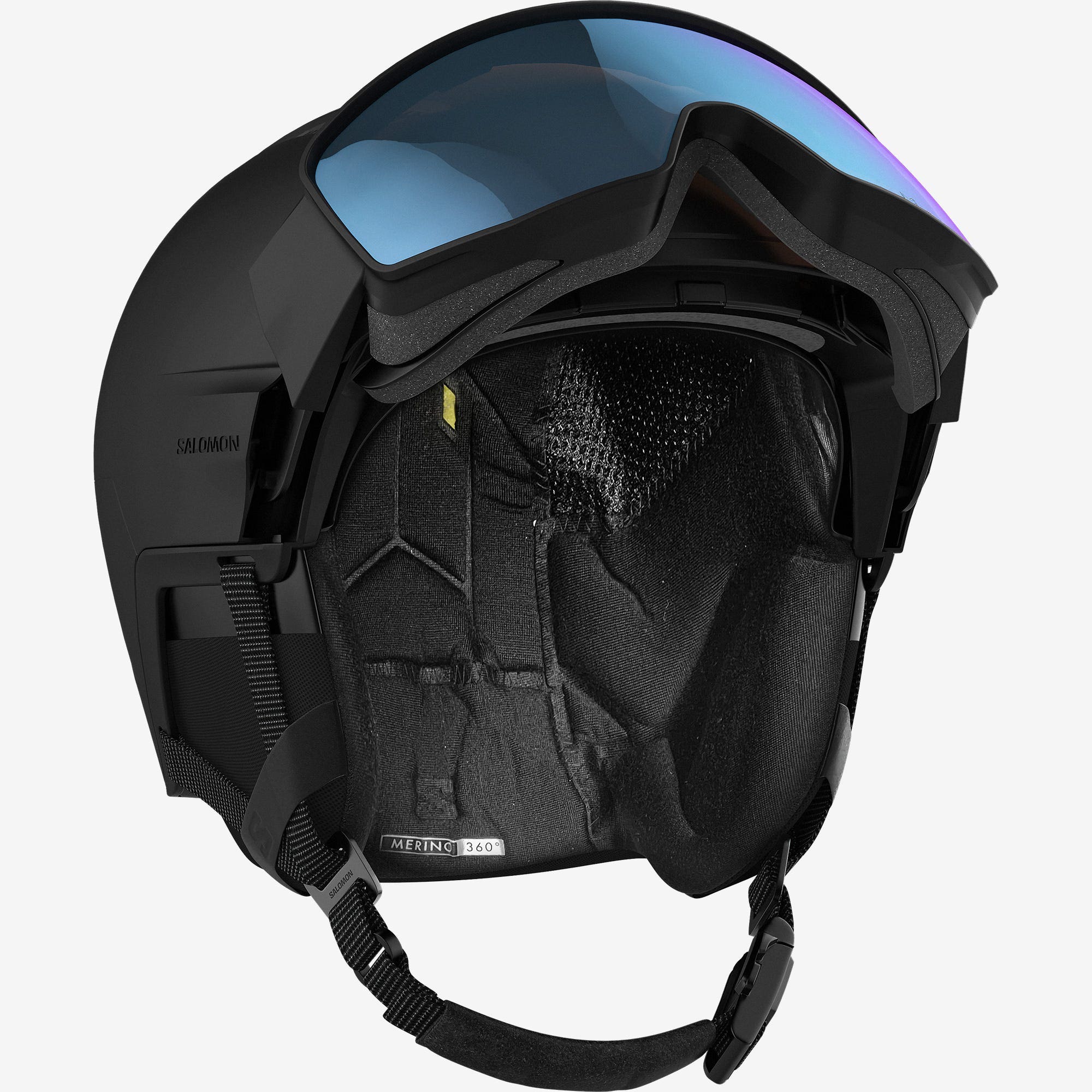 Schwarzer Salomon Skihelm Schwarzer Salomon Driver Prime Sigma Photo MIPS Skihelm mit blau getöntem Visier und verstellbarem Kinnriemen.