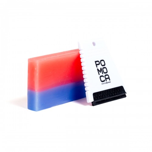 A blue and red block of wax with a white scraper.