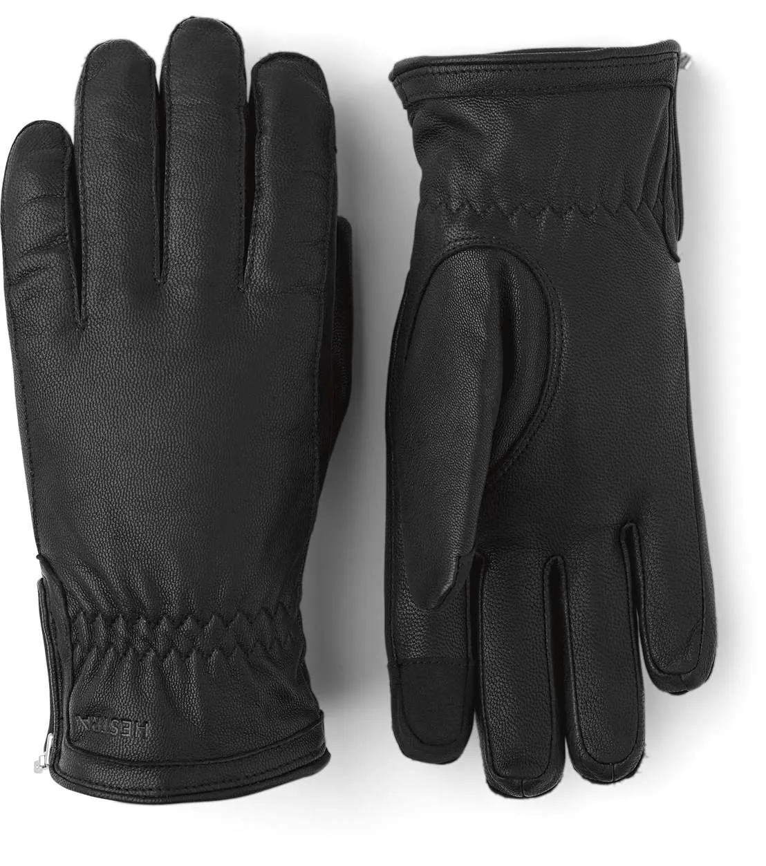 Zwei schwarze Lederhandschuhe, einer mit der Handfläche nach oben und einer mit dem Handrücken.