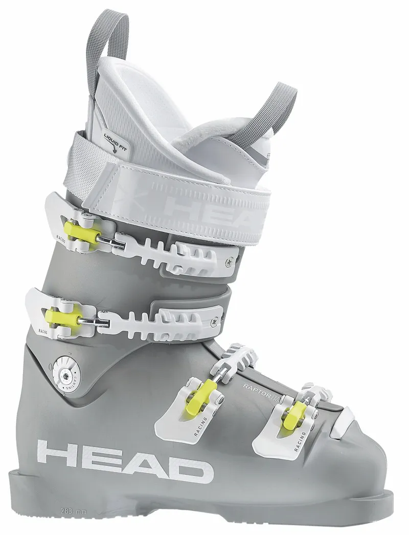 Grauer Ski-Schuh Head Raptor 110 RS mit weißen Schnallen und gelben Akzenten in Seitenansicht.