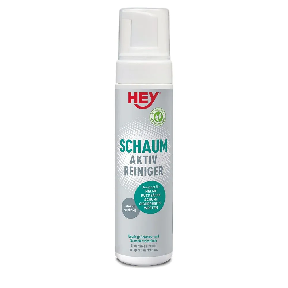 Nettoyant mousse actif Bouteille blanche avec tête de pulvérisation, portant l'inscription "Mousse active nettoyante" pour casques, sacs à dos, chaussures, gilets de sécurité.