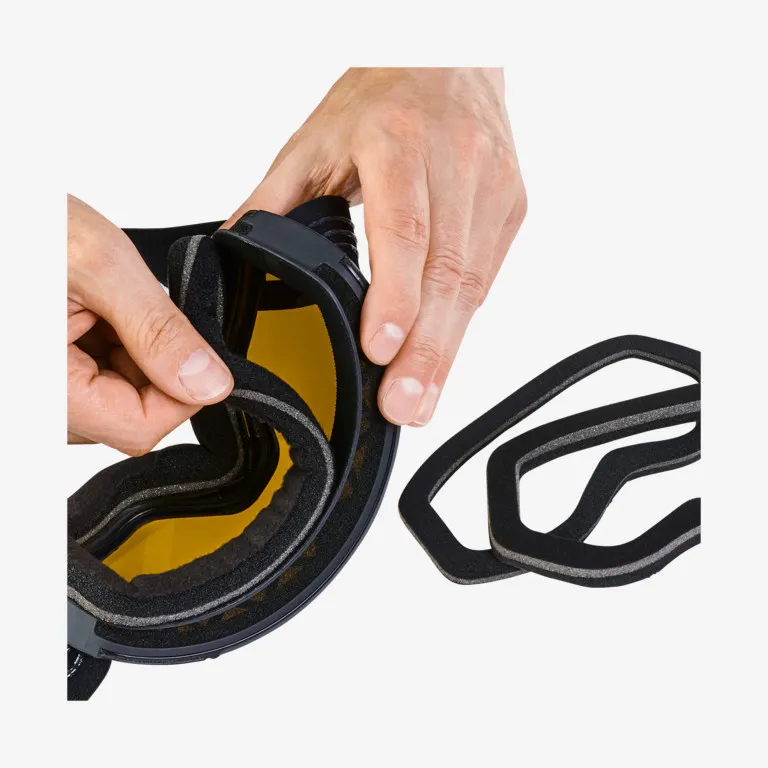 Hands mount Face-Foam on Sentinel DH ski goggles with yellow lens, replacement Face-Foam separately.