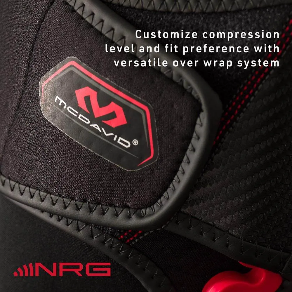 Detail of the McDavid NRG Knee Over Wrap 30590, over-wrap design with logo. Adjustable compression for support and comfort.