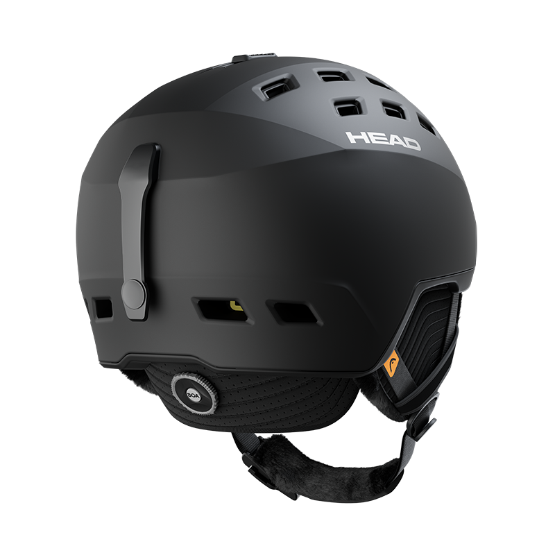 Schwarzer Head REV Mips Skihelm von hinten, mit Ohrenschützern und Einstellrad.