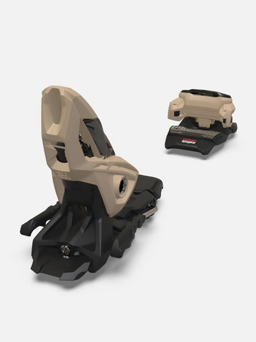 Primo piano dell'attacco Marker Squire 11 Tan, composto da ganasce anteriori e posteriori di colore beige e nero.
