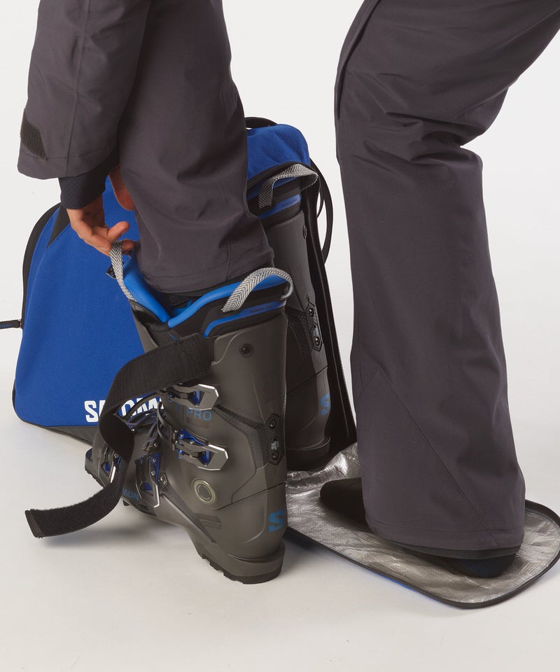 Salomon Les chaussures de ski sont emballées dans un sac bleu pour chaussures de ski Original Gearbag.