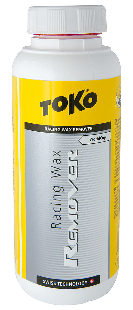 Weiße Flasche mit gelbem Etikett, Text "Toko Racing Wax Remover" in Schwarz und Silber.