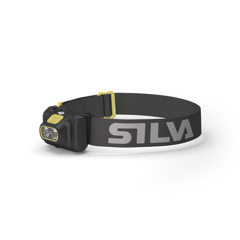 Gros plan sur la lampe frontale Silva Scout 3, avec bandeau noir et accents jaunes, vue de face.