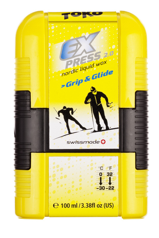 Gelbe Toko Express Grip & Glide Wachs-Verpackung mit Skifahrer-Abbildungen und Temperaturangaben.