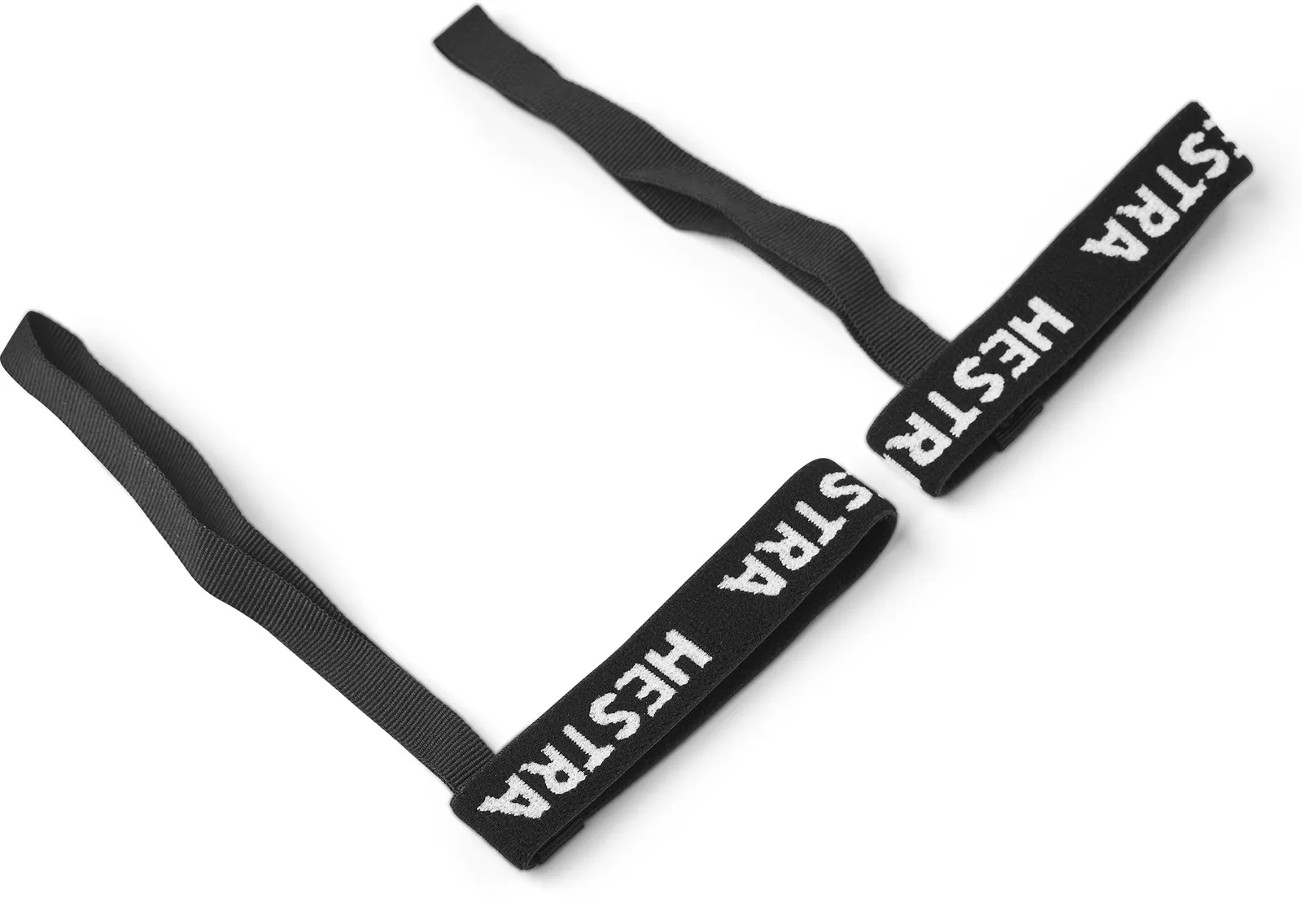 Zwei schwarze Bänder mit weißer Aufschrift "HESTRA STRA" liegen auf einem weißen Untergrund.