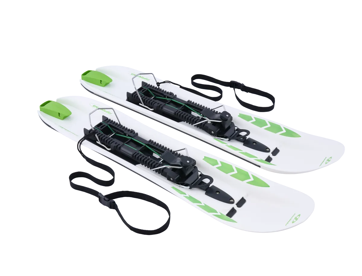 Two Crossblades hardboots, white with green accents, bindings and straps on a white background.