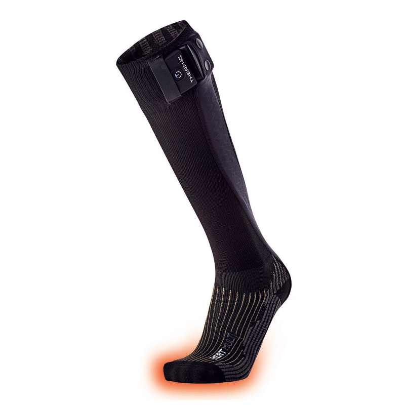 Eine schwarze Therm-ic Powersock Heat Multi, mit Akku am Bund, Fußbereich leuchtet rot.