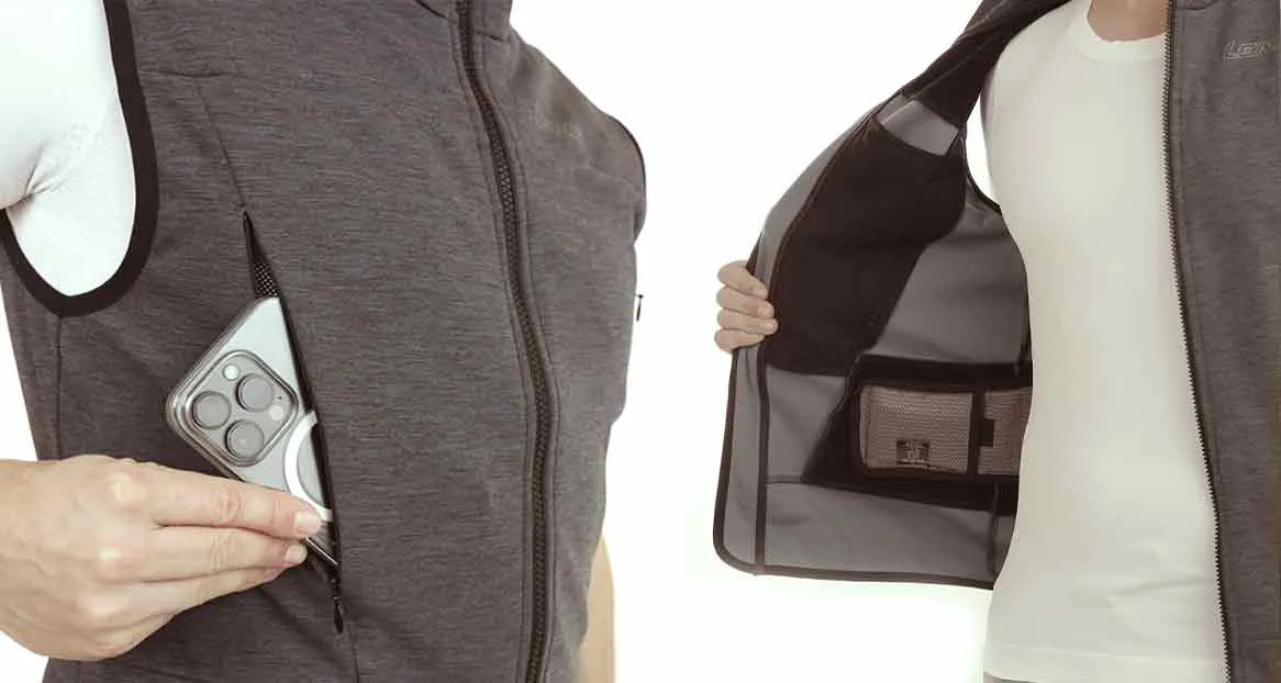 People wear gray sleeveless jackets with zippers. One hand pushes a smartphone into a zippered pocket. Inner pocket visible.