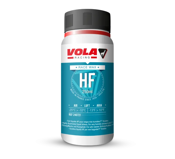 Flasche Vola Racing Race Bleu HF Flüssigwachs, blaues Etikett mit weißer Schrift.
