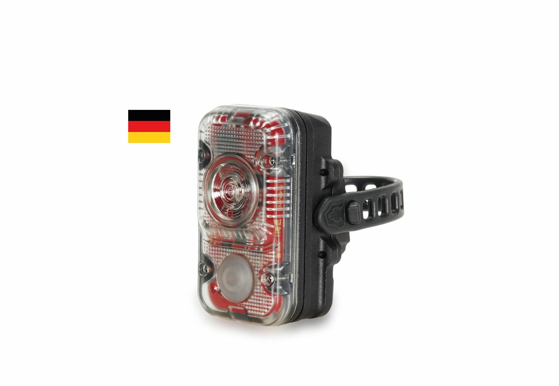 Fahrrad Rotlicht Max (STVZO) mit transparentem Gehäuse und Montageband, daneben eine kleine Deutschland Flagge.