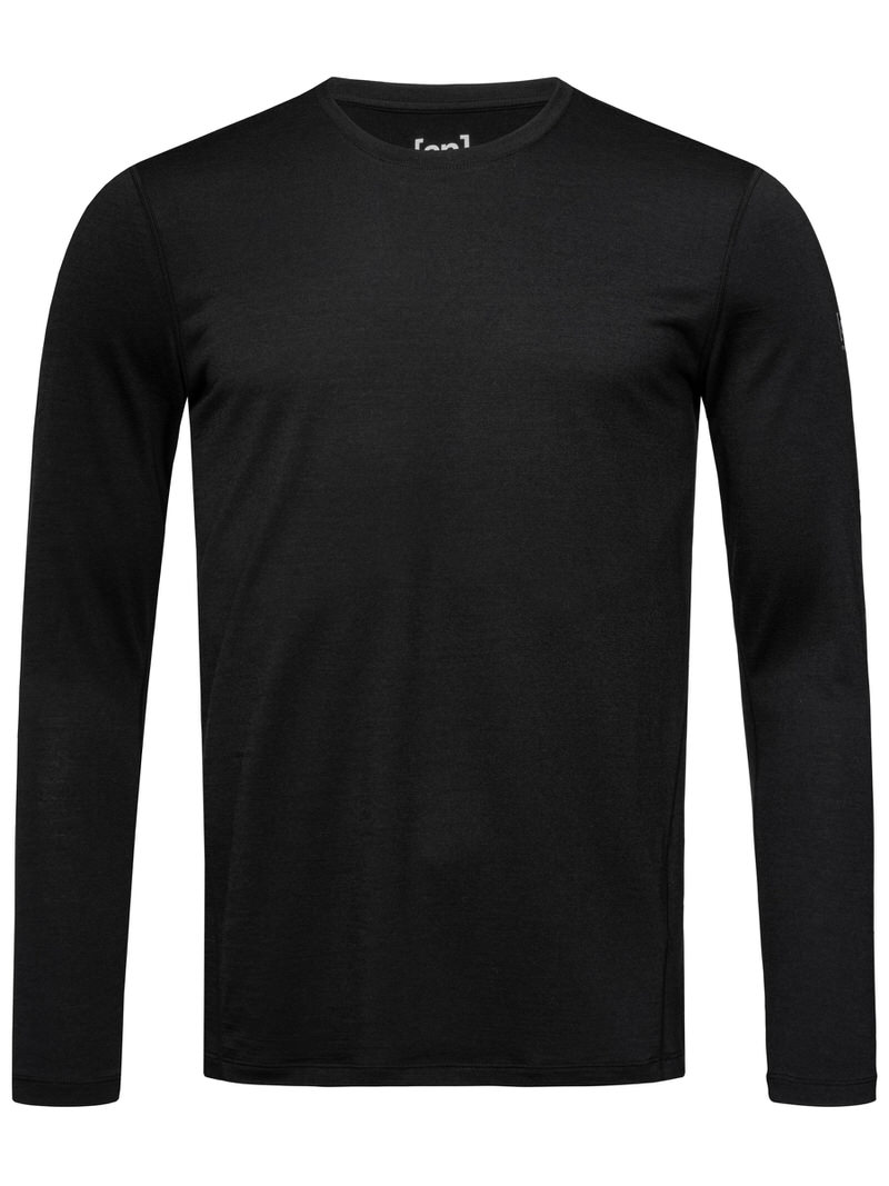 T-shirt noir à manches longues T-shirt noir à manches longues Super.Natural M Base LS 175, de face, avec col rond et manches longues.