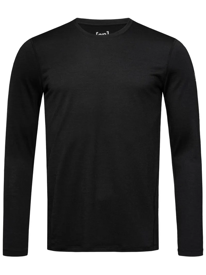 T-shirt noir à manches longues Super.Natural M Base LS 175, de face, avec col rond et manches longues.