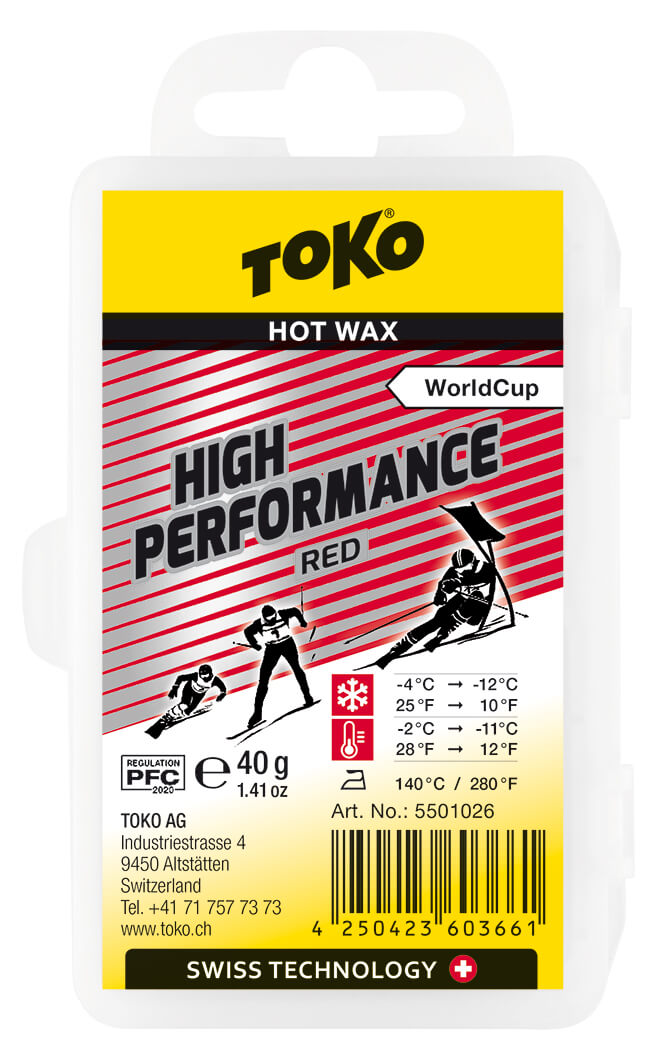 Verpackung Toko High Performance Red Heisswachs mit Skifahrer-Illustrationen.