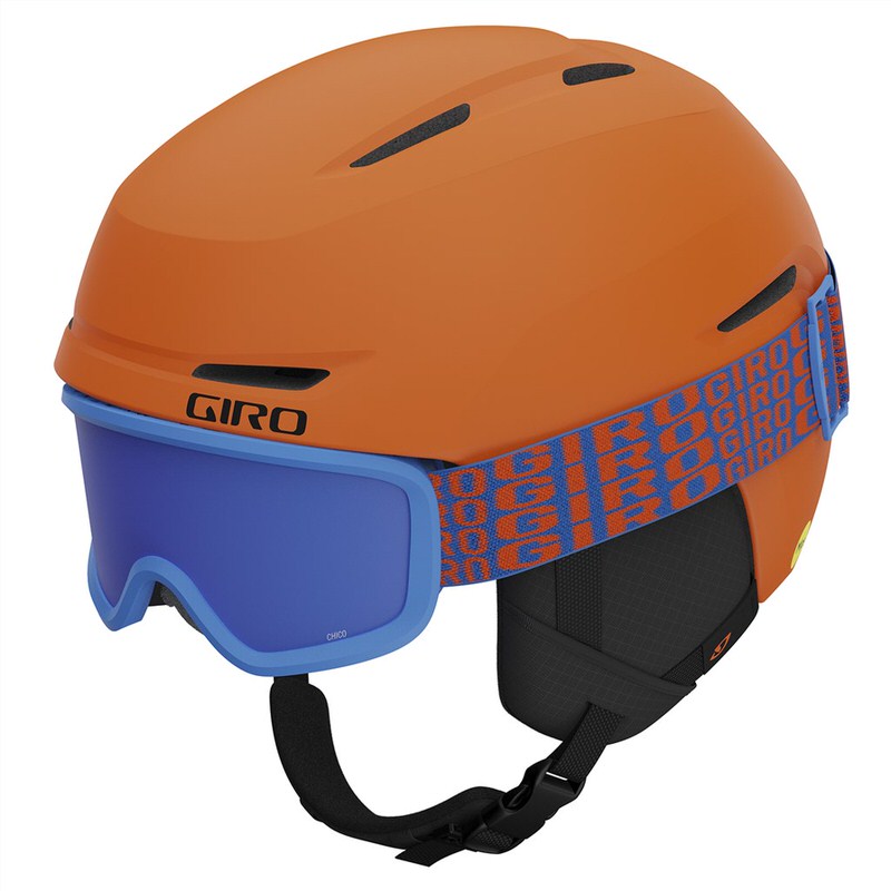 Casque de ski orange clair mat Giro Spur Flash Combo avec lunettes de ski bleues.