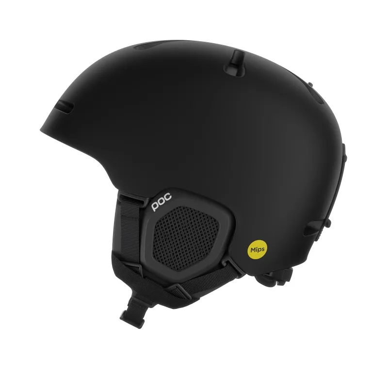 Black ski helmet, side view. The helmet has ear covers, a yellow Mips logo and the POC logo. The background is white.
