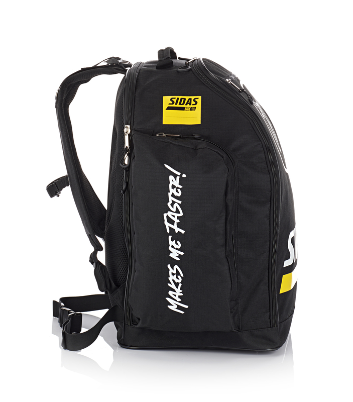 Sidas Race Boot Bag Schwarze Sidas Race Boot Bag 60L mit Tragegurten, gelbem Logo und weißem Schriftzug "MAKES ME FASTER!".