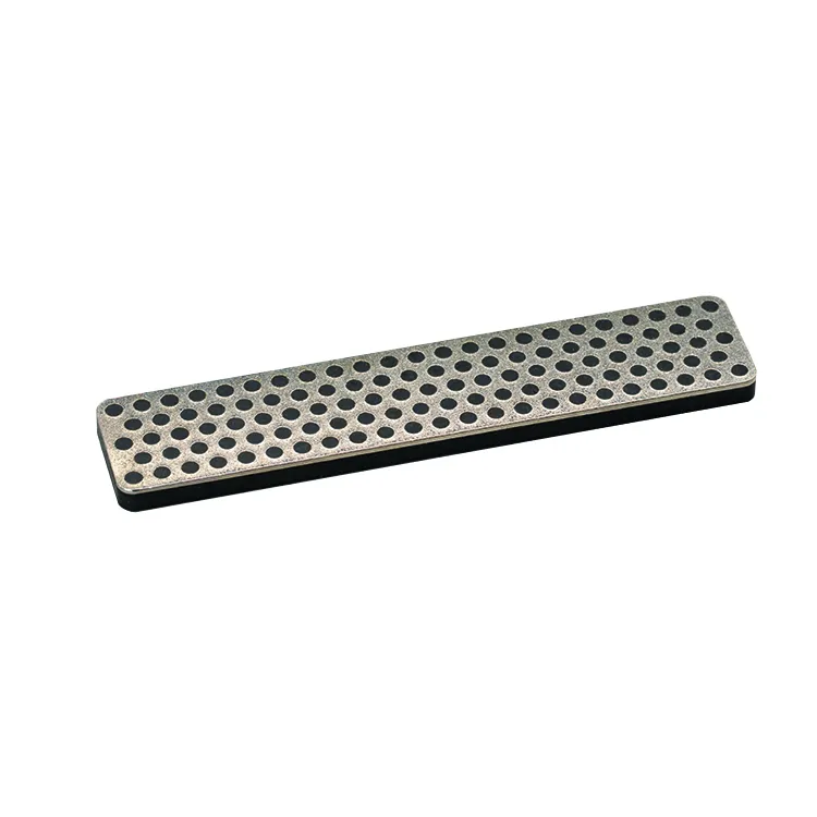 Rectangular Snoli diamond file with many holes on the surface.
