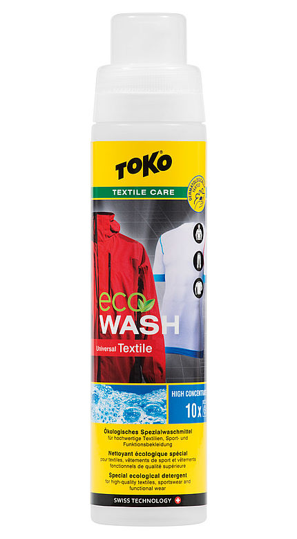 Toko Eco Textile Wash Eine Flasche Toko Eco Textile Wash mit Textil Pflegehinweisen und Kleidung auf dem Etikett.