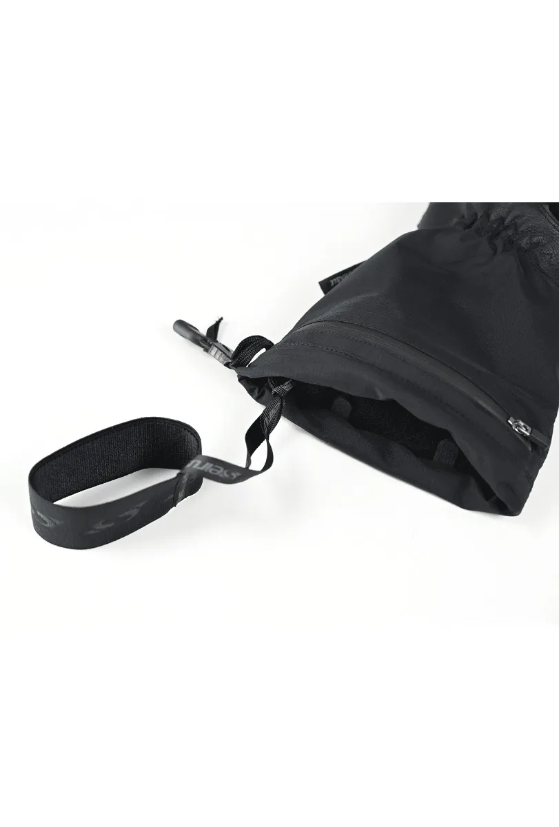 Close-up of a black glove with elastic loop, part of the Comfort Leash, against a white background.